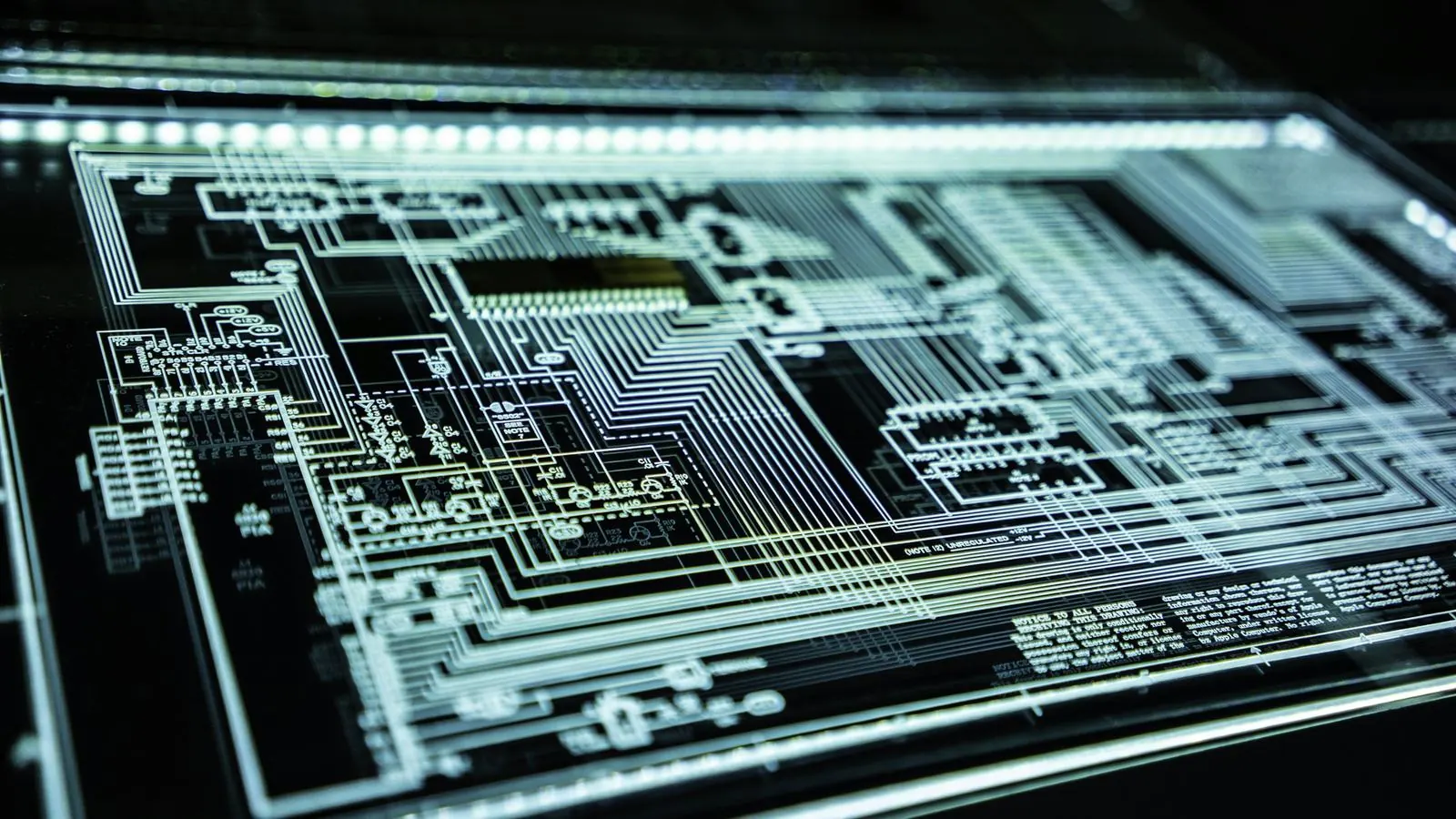 Illuminated circuit board pattern representing cybersecurity