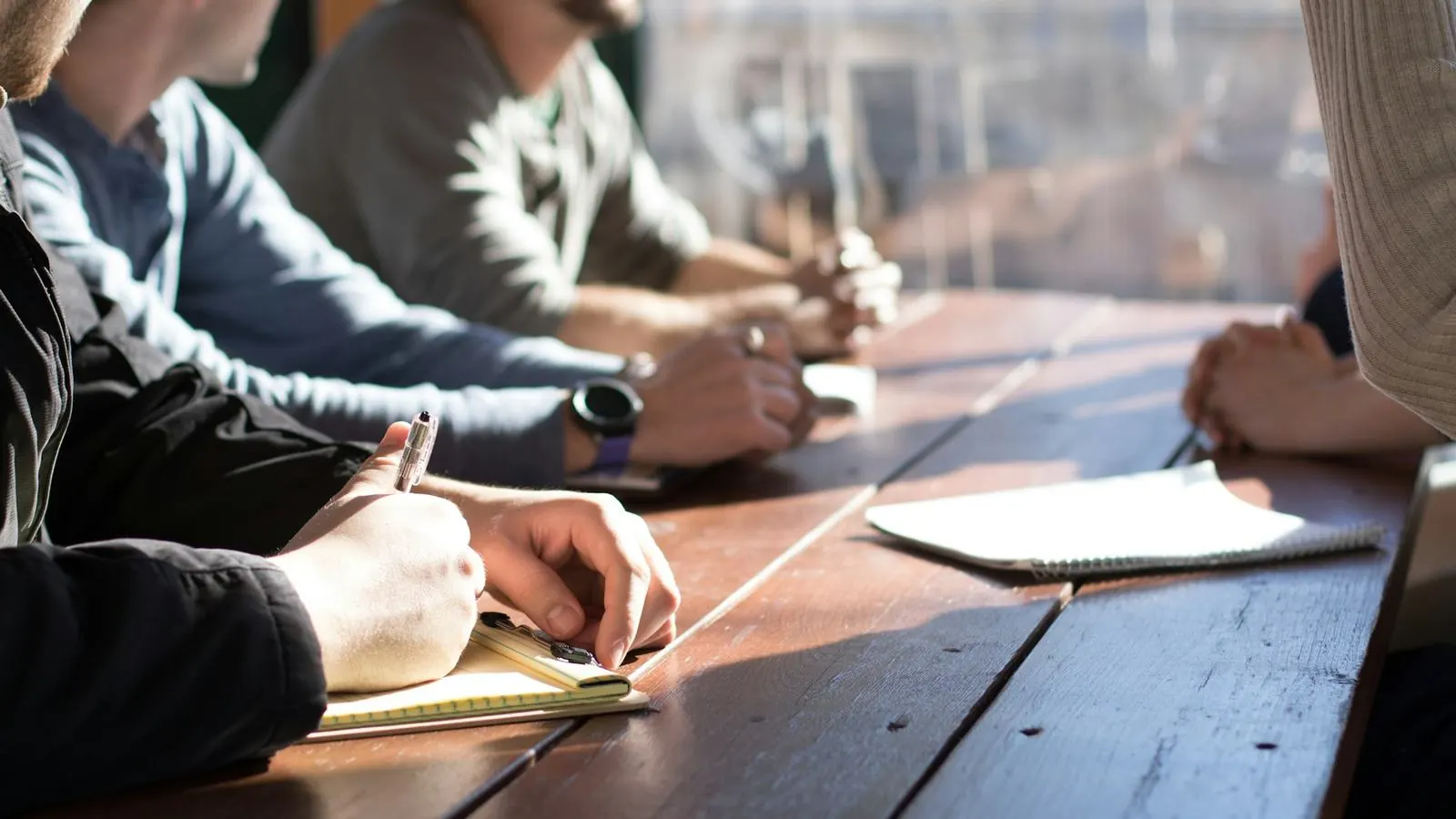 Executives around a boardroom table