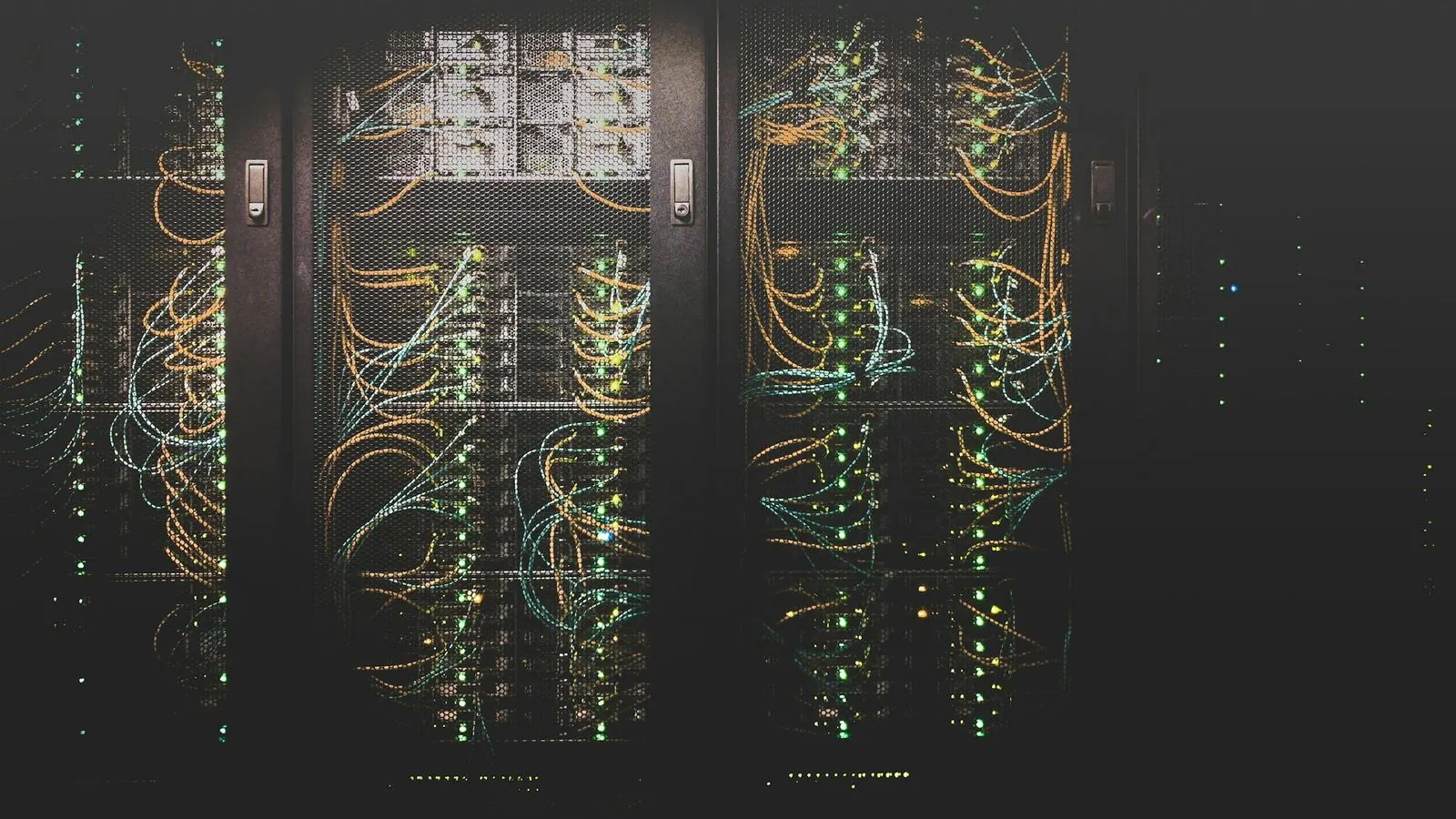 Server racks with network cabling in a data room