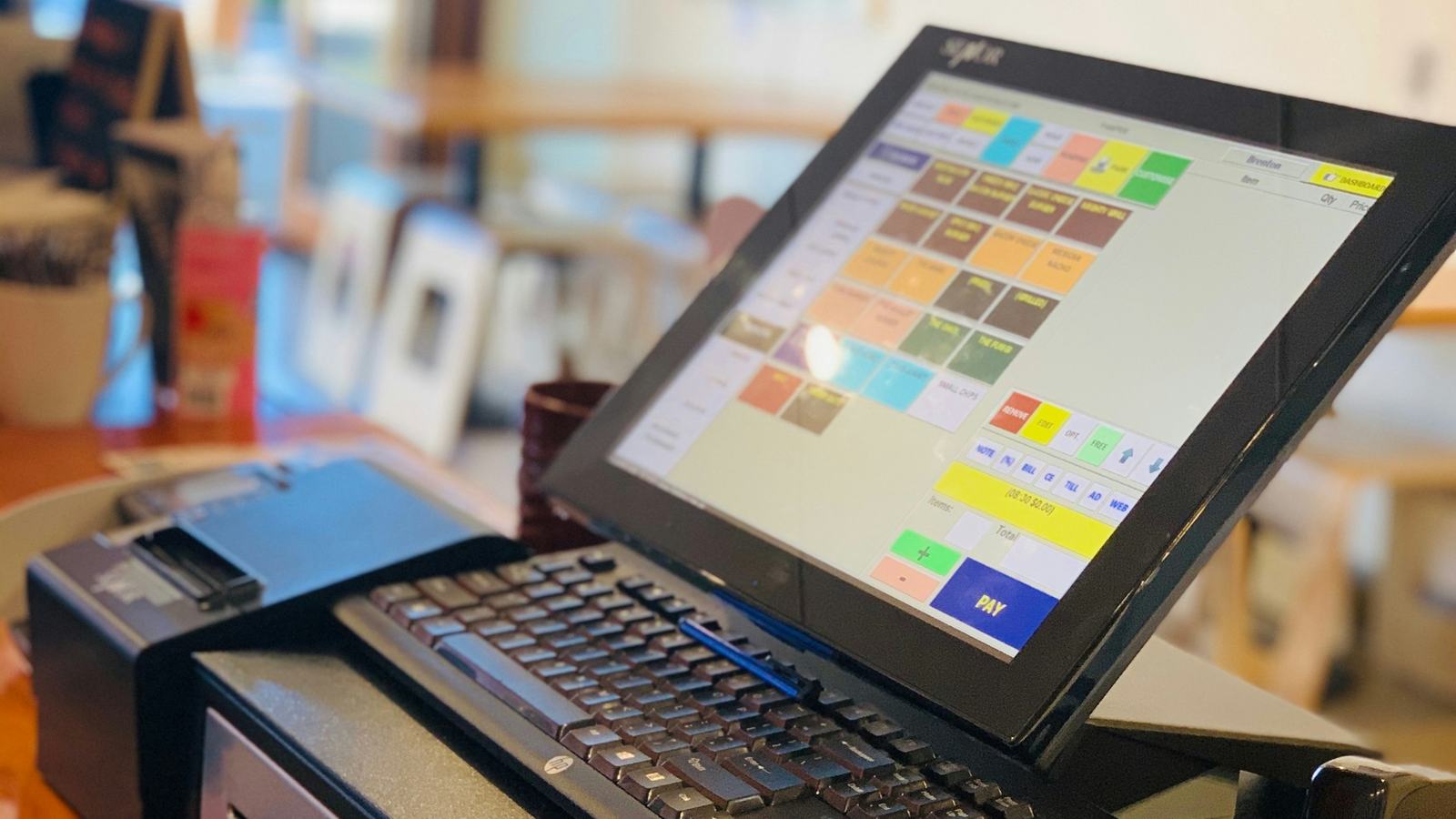 Touchscreen property system terminal with keyboard at a service counter
